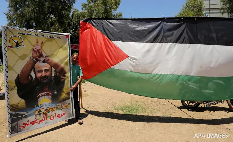 Palestinians celebrate after Palestinian prisoners in Israeli jails suspend hunger strike, in Gaza city on May 27, 2017. Hundreds of Palestinian prisoners on Saturday ended a 40-day hunger strike over conditions in Israe...