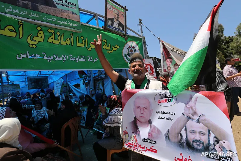 Palestinians celebrate after Palestinian prisoners in Israeli jails suspend hunger strike, in Gaza city on May 27, 2017. Hundreds of Palestinian prisoners on Saturday ended a 40-day hunger strike over conditions in Israe...