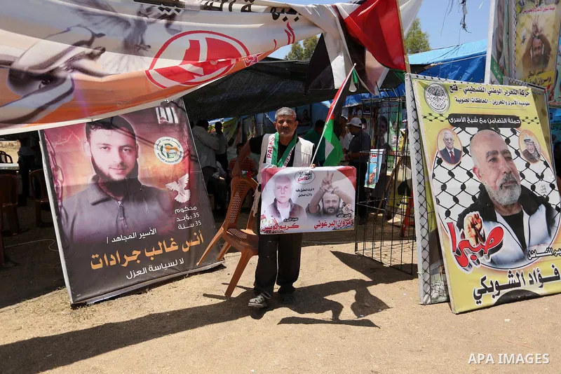 Palestinians celebrate after Palestinian prisoners in Israeli jails suspend hunger strike, in Gaza city on May 27, 2017. Hundreds of Palestinian prisoners on Saturday ended a 40-day hunger strike over conditions in Israe...