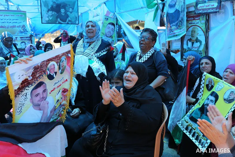 Palestinians celebrate after Palestinian prisoners in Israeli jails suspend hunger strike, in Gaza city on May 27, 2017. Hundreds of Palestinian prisoners on Saturday ended a 40-day hunger strike over conditions in Israe...