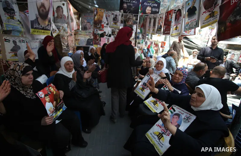 Palestinians celebrate after Palestinian prisoners ended a hunger strike over their conditions in Israeli jails, in the West Bank city of Nablus May 27, 2017. Hundreds of Palestinian prisoners on Saturday ended a 40-day...