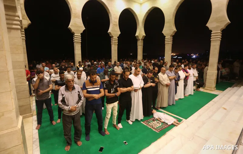 Palestinian Muslim worshipers perform "Taraweeh", nightly prayer of the month of Ramadan, at El Khalidi mosque, in Gaza city, on May 27, 2017. Ramadan is sacred to Muslims because it is during that month that tradition s...