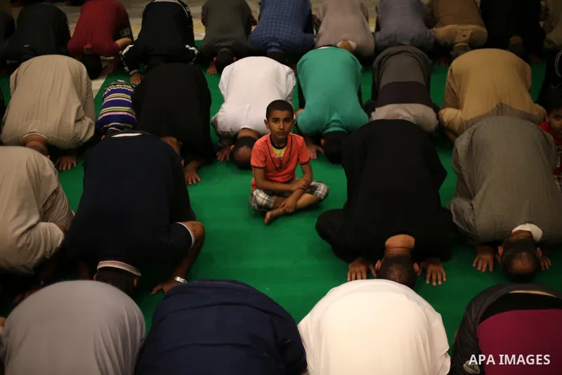 Palestinian Muslim worshipers perform "Taraweeh", nightly prayer of the month of Ramadan, at El Khalidi mosque, in Gaza city, on May 27, 2017. Ramadan is sacred to Muslims because it is during that month that tradition s...