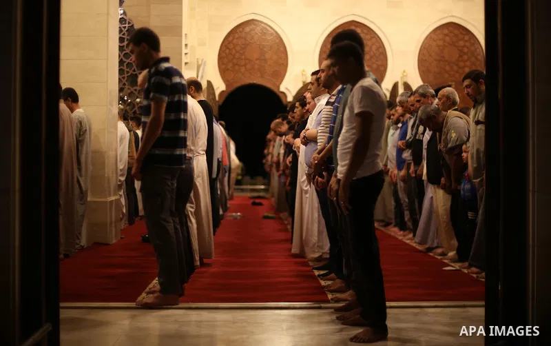 Palestinian Muslim worshipers perform "Taraweeh", nightly prayer of the month of Ramadan, at El Khalidi mosque, in Gaza city, on May 27, 2017. Ramadan is sacred to Muslims because it is during that month that tradition s...