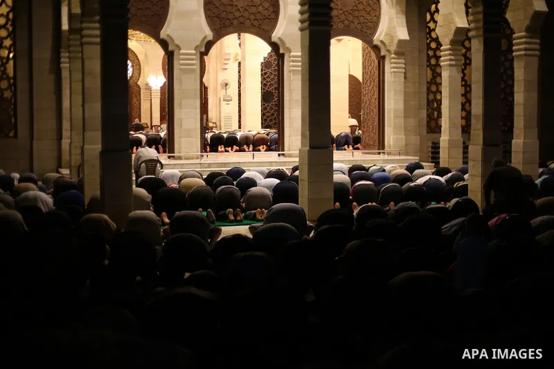 Palestinian Muslim worshipers perform "Taraweeh", nightly prayer of the month of Ramadan, at El Khalidi mosque, in Gaza city, on May 27, 2017. Ramadan is sacred to Muslims because it is during that month that tradition s...