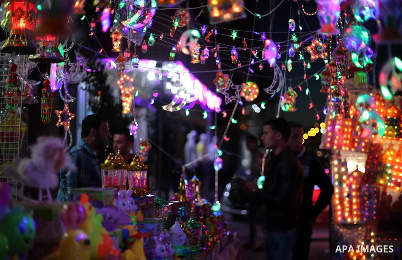 A Palestinian vendor displays traditional lanterns known in Arabic as "Fanous" at his shop on the Muslim holy fasting month of Ramadan on Gaza city on May 28, 2017. Ramadan is sacred to Muslims because it is during that...