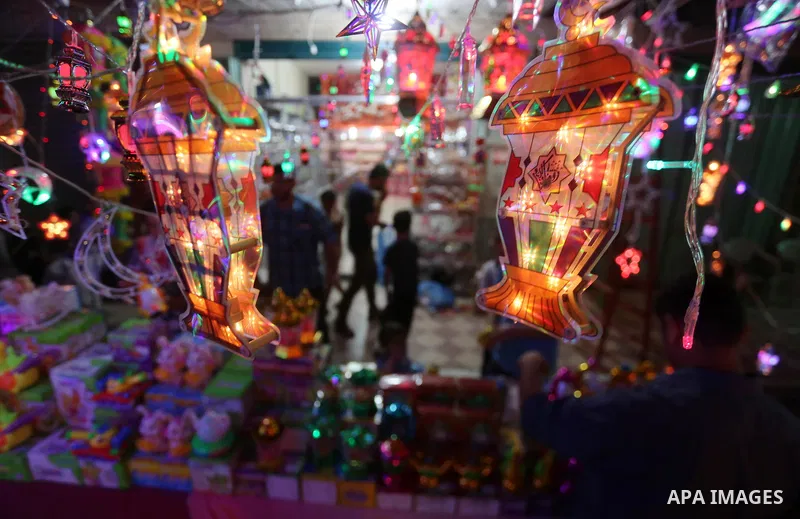 A Palestinian vendor displays traditional lanterns known in Arabic as "Fanous" at his shop on the Muslim holy fasting month of Ramadan on Gaza city on May 28, 2017. Ramadan is sacred to Muslims because it is during that...