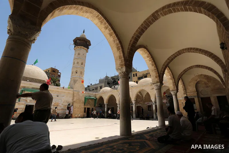 Palestinians pray on the Muslim holy fasting month of Ramadan at the al- Sayed Hashim mosque in Gaza city on May 29, 2017. Ramadan is sacred to Muslims because it is during that month that tradition says the Koran was re...