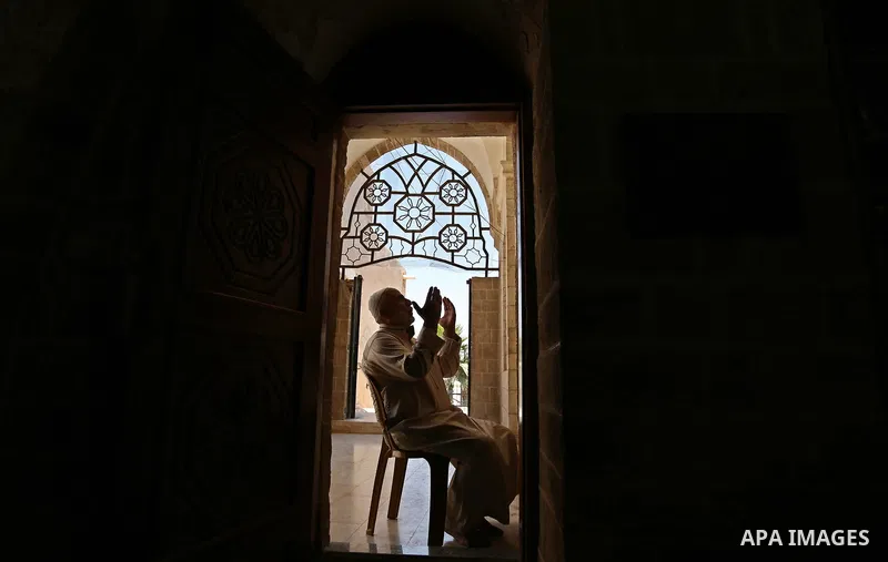 A Palestinian man prays on the Muslim holy fasting month of Ramadan at the al- Sayed Hashim mosque in Gaza city on May 29, 2017. Ramadan is sacred to Muslims because it is during that month that tradition says the Koran...