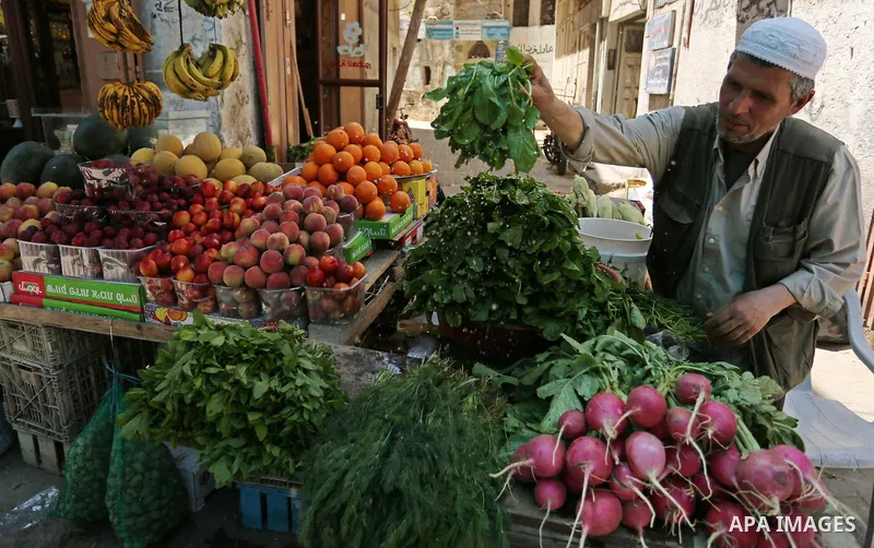 A Palestinian vendor sells Vegetables on the Muslim holy fasting month of Ramadan at market in Gaza city on May 29, 2017. Ramadan is sacred to Muslims because it is during that month that tradition says the Koran was rev...
