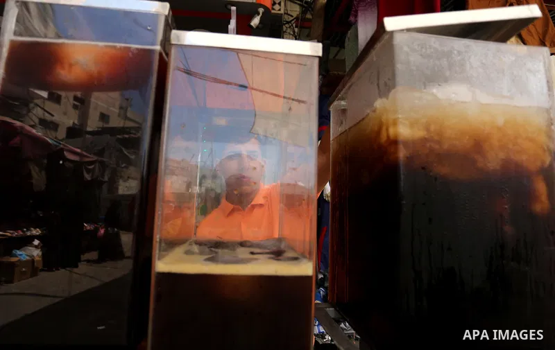 A Palestinian vendor sells Juices on the Muslim holy fasting month of Ramadan at market in Gaza city on May 29, 2017. Ramadan is sacred to Muslims because it is during that month that tradition says the Koran was reveale...
