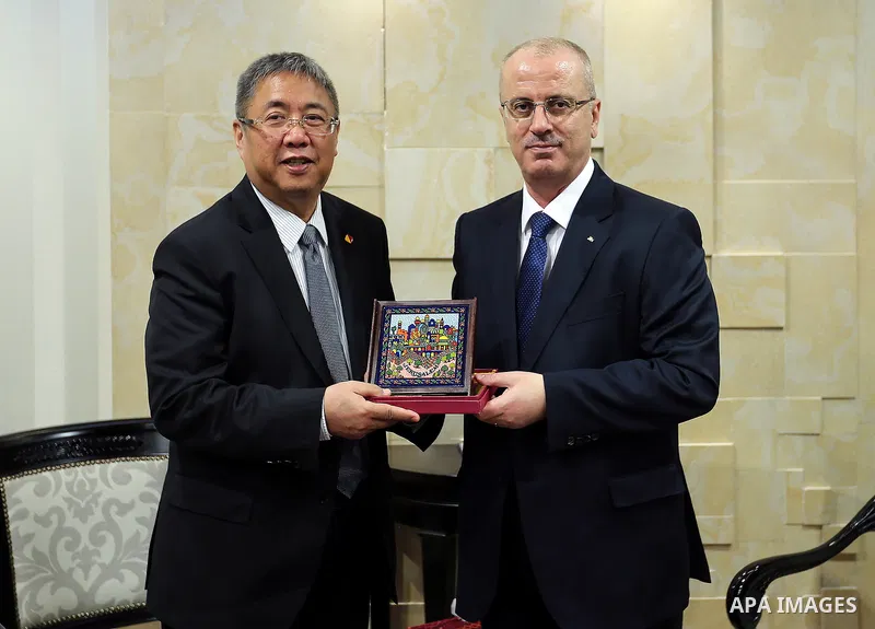 Palestinian Prime Minister Rami Hamdallah meets with Gong Xiaosheng, China's special envoy on Middle East affairs, in the West Bank city of Ramallah on May 30, 2017. Photo by Prime Minister Office