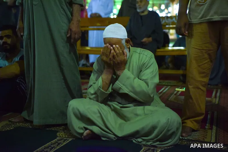 Egyptian worshipers perform take part in an evening prayer "Taraweeh", at Amr Ibn al-Aas mosque, in Cairo on May 30, 2017. Ramadan is sacred to Muslims because it is during that month that tradition says the Koran was re...