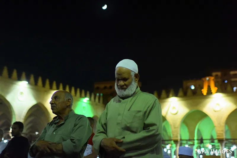 Egyptian worshipers perform take part in an evening prayer "Taraweeh", at Amr Ibn al-Aas mosque, in Cairo on May 30, 2017. Ramadan is sacred to Muslims because it is during that month that tradition says the Koran was re...