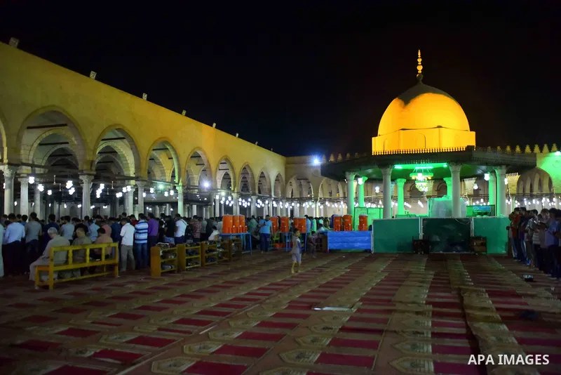 Egyptian worshipers perform take part in an evening prayer "Taraweeh", at Amr Ibn al-Aas mosque, in Cairo on May 30, 2017. Ramadan is sacred to Muslims because it is during that month that tradition says the Koran was re...