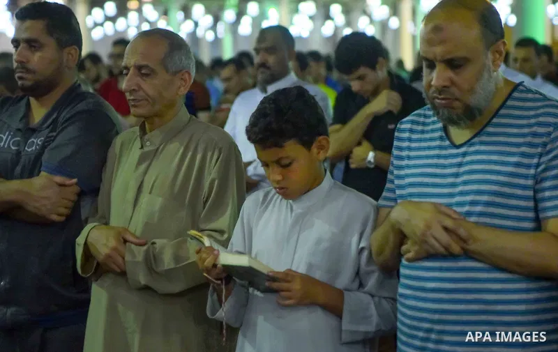 Egyptian worshipers perform take part in an evening prayer "Taraweeh", at Amr Ibn al-Aas mosque, in Cairo on May 30, 2017. Ramadan is sacred to Muslims because it is during that month that tradition says the Koran was re...