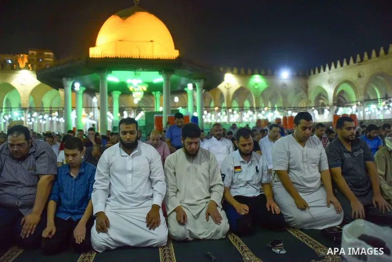 Egyptian worshipers perform take part in an evening prayer "Taraweeh", at Amr Ibn al-Aas mosque, in Cairo on May 30, 2017. Ramadan is sacred to Muslims because it is during that month that tradition says the Koran was re...