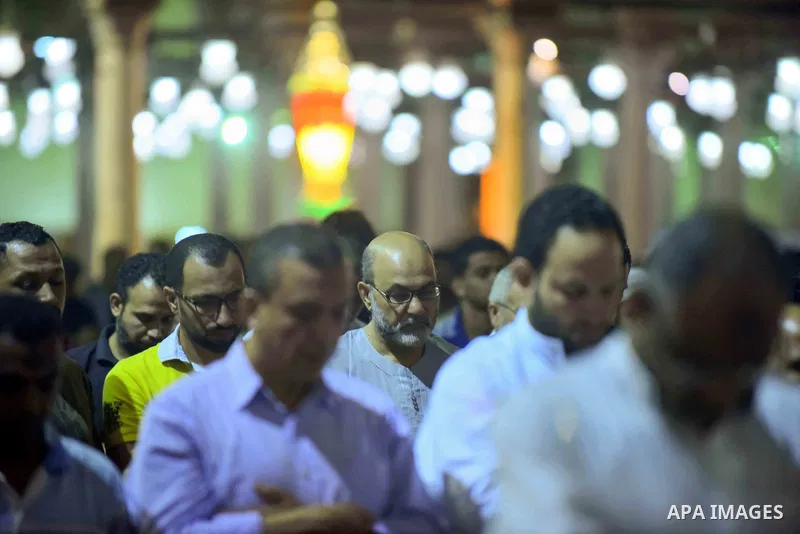 Egyptian worshipers perform take part in an evening prayer "Taraweeh", at Amr Ibn al-Aas mosque, in Cairo on May 30, 2017. Ramadan is sacred to Muslims because it is during that month that tradition says the Koran was re...