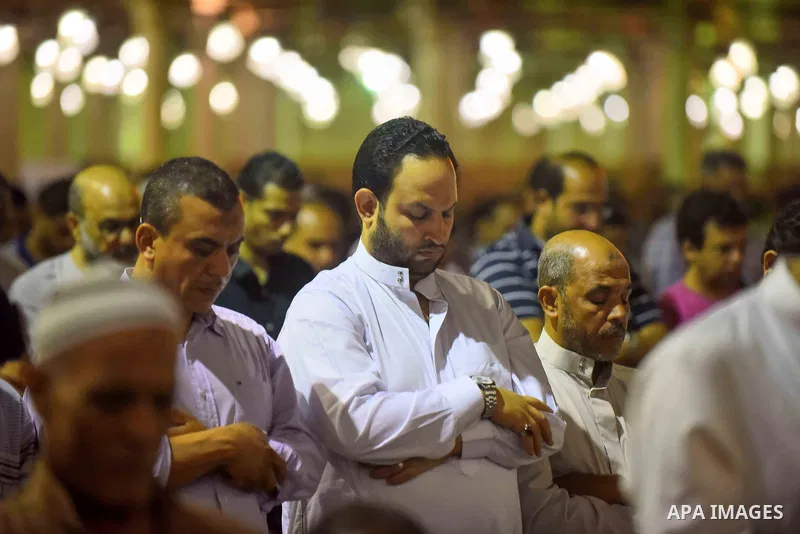 Egyptian worshipers perform take part in an evening prayer "Taraweeh", at Amr Ibn al-Aas mosque, in Cairo on May 30, 2017. Ramadan is sacred to Muslims because it is during that month that tradition says the Koran was re...