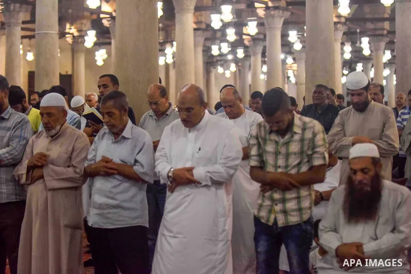 Egyptian worshipers perform take part in an evening prayer "Taraweeh", at Amr Ibn al-Aas mosque, in Cairo on May 30, 2017. Ramadan is sacred to Muslims because it is during that month that tradition says the Koran was re...