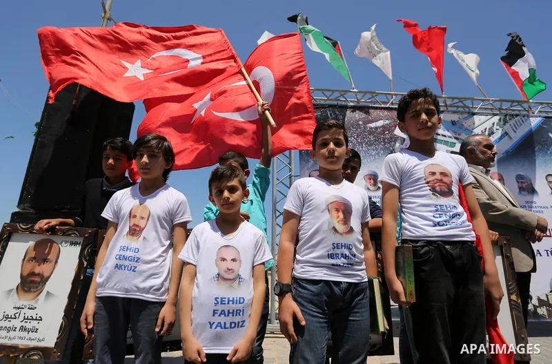 Palestinian children take part during a rally to mark the 7th anniversary of the Mavi Marmara Gaza flotilla incident, at the seaport of Gaza City May 31, 2017. Nine activists, eight Turkish and one Turkish-American, died...