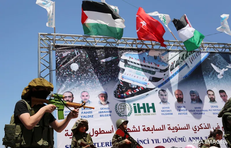Palestinian children take part during a rally to mark the 7th anniversary of the Mavi Marmara Gaza flotilla incident, as they simulate the raided of Israeli commandos to Mavi Marmara ship, at the seaport of Gaza City May...
