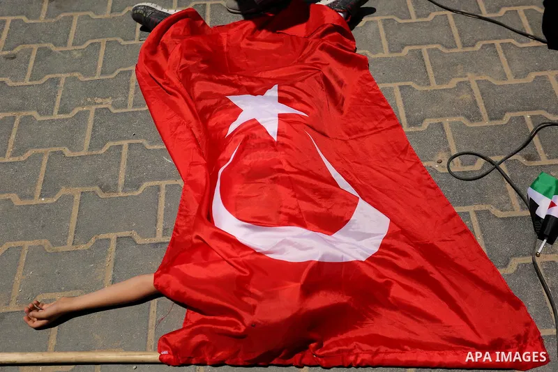 Palestinian children take part during a rally to mark the 7th anniversary of the Mavi Marmara Gaza flotilla incident, as they simulate the raided of Israeli commandos to Mavi Marmara ship, at the seaport of Gaza City May...