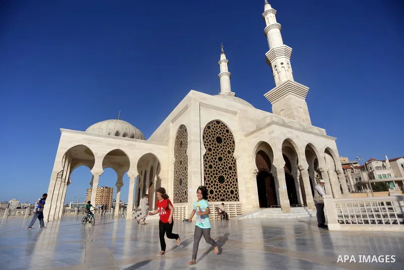 Palestinian children play, on the Muslim holy fasting month of Ramadan at al-Khaldi mosque in Gaza city on May 31, 2017. Ramadan is sacred to Muslims because it is during that month that tradition says the Koran was reve...