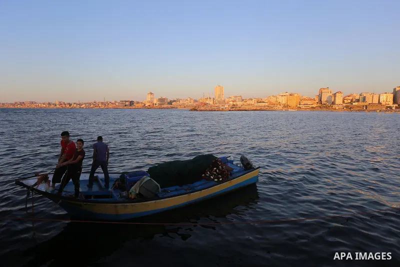 A general view shows the beach of Gaza city during a sunset on May 31, 2017, during the Muslim Holy month of Ramadan. Ramadan is sacred to Muslims because it is during that month that tradition says the Koran was reveale...