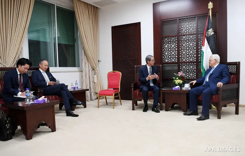 Palestinian President Mahmoud Abbas meets with Japanese envoy, in the West Bank city of Ramallah on May 31, 2017. Photo by Osama Falah