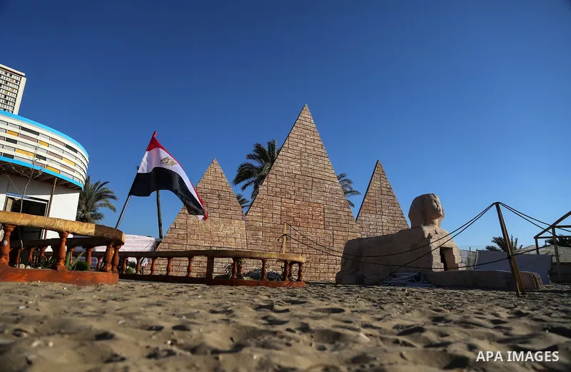 A Picture shows a wooden sculpture of the Pyramids of Giza at a technical site in the southern Gaza Strip town of Rafah, near the border with Egypt, on June 1, 2017. Young artists Palestinian artists Nidal Al-Jarami and...