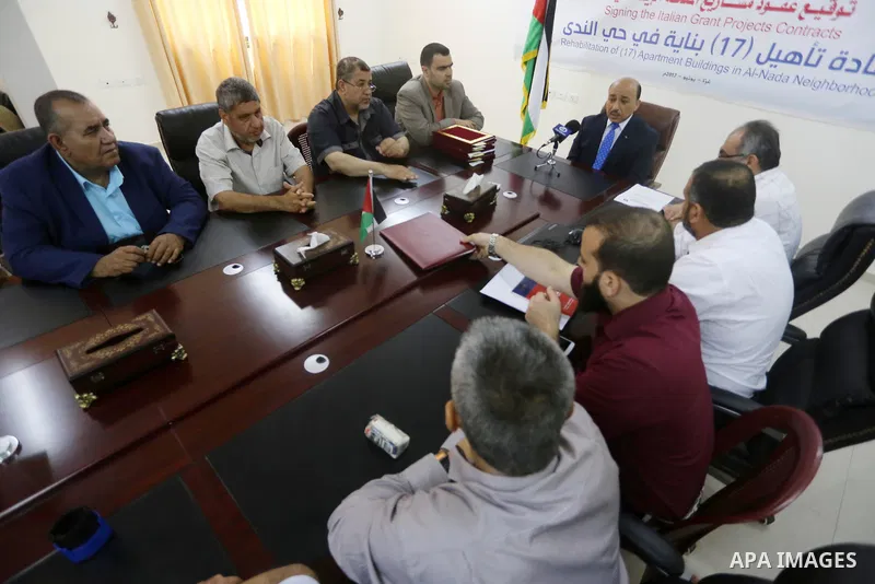 Palestinian Minister of public works and housing, Mofeed al-Hasayna attends the signing the Italian grant projects contracts, in Gaza city on June 01, 2017. Photo by Mohammed Asad