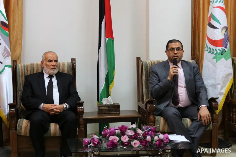 Members of the Palestinian legislative council from Hamas movement attend a meeting to donate their salary for this month to for cancer and kidneys patients, at al-Shifa hospital, in Gaza city on June 01, 2017. Photo by...