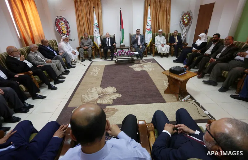 Members of the Palestinian legislative council from Hamas movement attend a meeting to donate their salary for this month to for cancer and kidneys patients, at al-Shifa hospital, in Gaza city on June 01, 2017. Photo by...