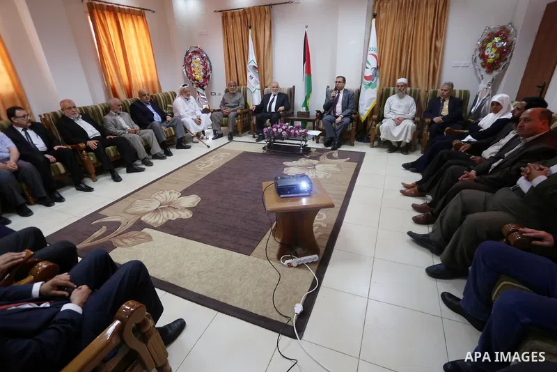 Members of the Palestinian legislative council from Hamas movement attend a meeting to donate their salary for this month to for cancer and kidneys patients, at al-Shifa hospital, in Gaza city on June 01, 2017. Photo by...