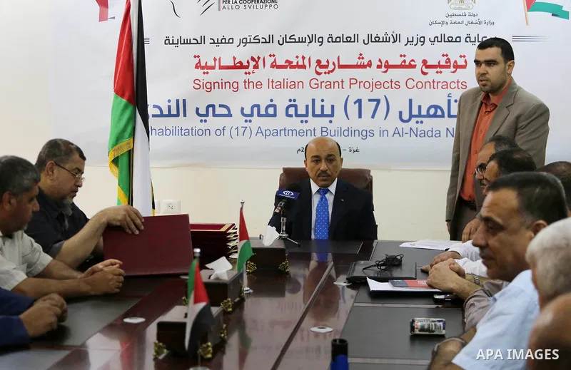 Palestinian Minister of public works and housing, Mofeed al-Hasayna attends the signing the Italian grant projects contracts, in Gaza city on June 01, 2017. Photo by Mohammed Asad
