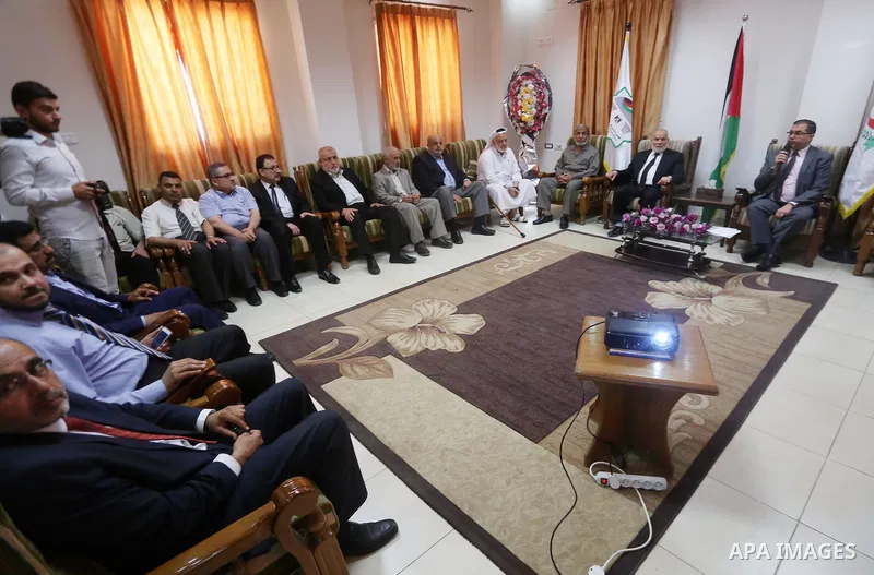 Members of the Palestinian legislative council from Hamas movement attend a meeting to donate their salary for this month to for cancer and kidneys patients, at al-Shifa hospital, in Gaza city on June 01, 2017. Photo by...