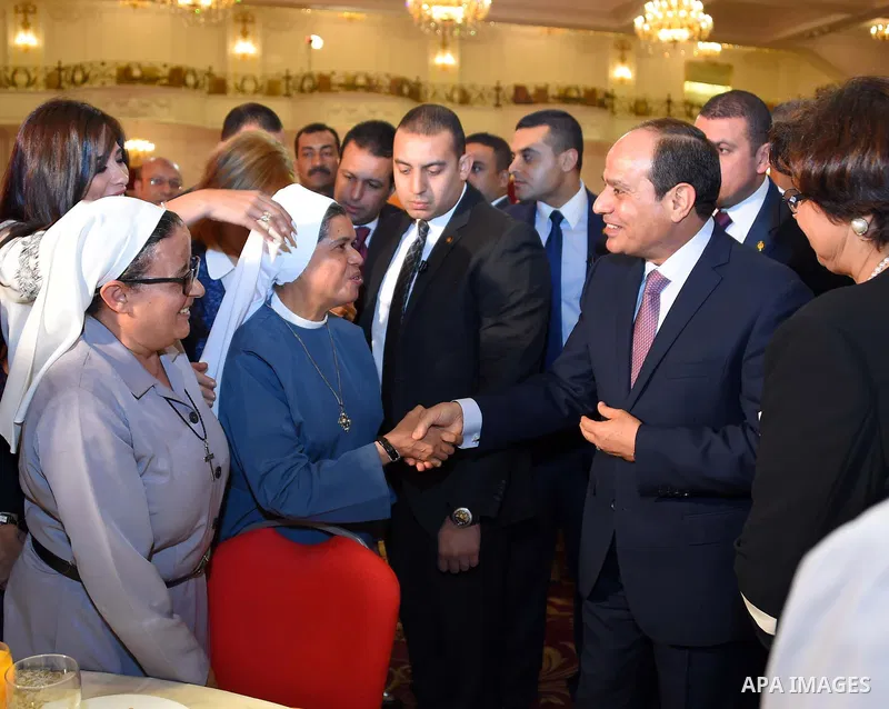 Egyptian President Abdel Fattah al-Sisi takes part in Iftar meal during a ceremony of women's year on the Muslim holy fasting month of Ramadan in Cairo, Egypt, on June 03, 2017. Ramadan is sacred to Muslims because it is...
