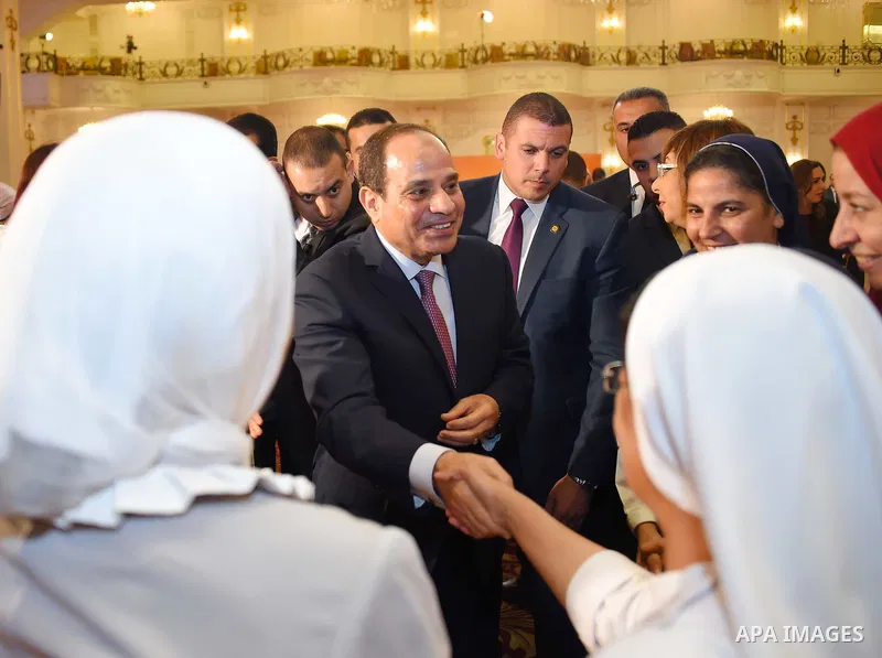 Egyptian President Abdel Fattah al-Sisi takes part in Iftar meal during a ceremony of women's year on the Muslim holy fasting month of Ramadan in Cairo, Egypt, on June 03, 2017. Ramadan is sacred to Muslims because it is...