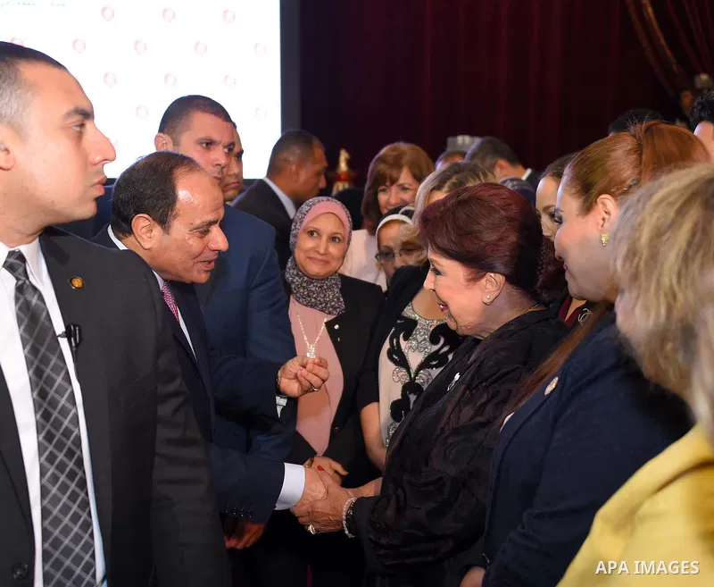 Egyptian President Abdel Fattah al-Sisi takes part in Iftar meal during a ceremony of women's year on the Muslim holy fasting month of Ramadan in Cairo, Egypt, on June 03, 2017. Ramadan is sacred to Muslims because it is...