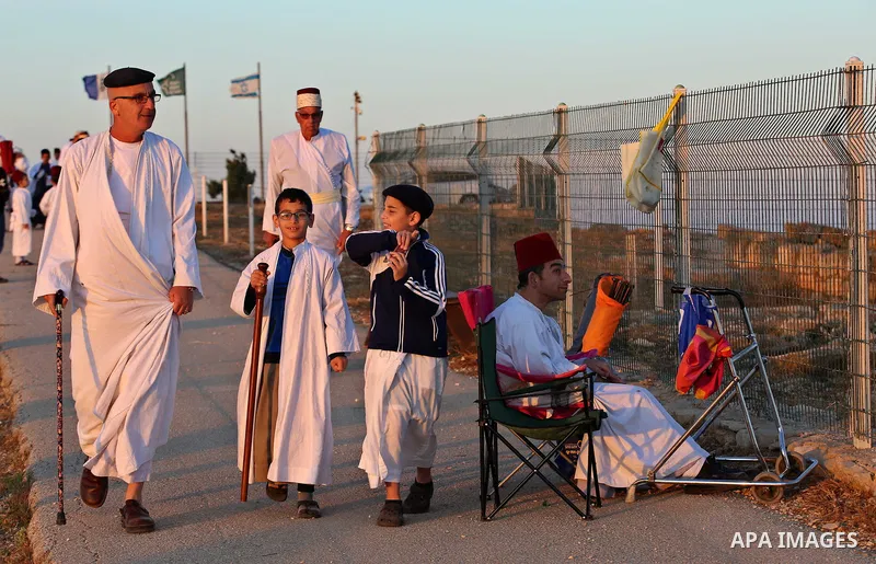 Samaritan worshipers gather to pray on the top of Mount Gerizim in a traditional pilgrimage to mark the Shavuot's holiday at dawn near the West Bank city of Nablus June 4, 2017 which is giving of the Torah at Mount Sinai...