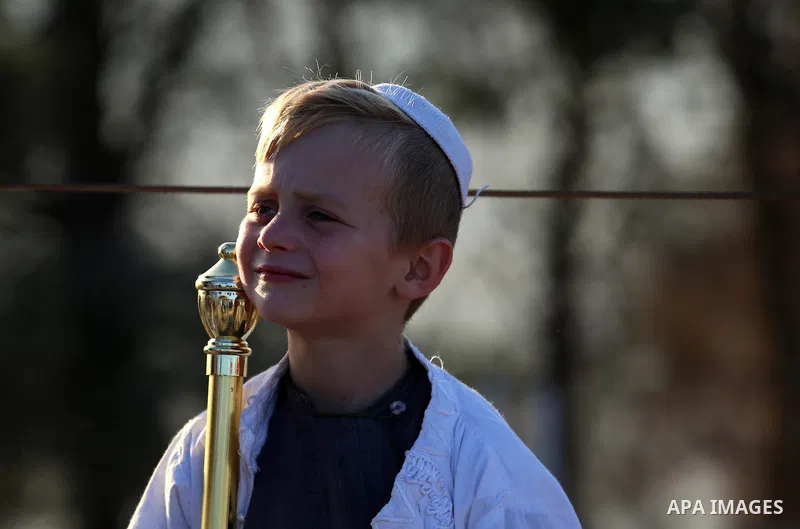 A young Samaritan prays on the top of Mount Gerizim in a traditional pilgrimage to mark the Shavuot's holiday at dawn near the West Bank city of Nablus June 4, 2017 which is giving of the Torah at Mount Sinai seven weeks...