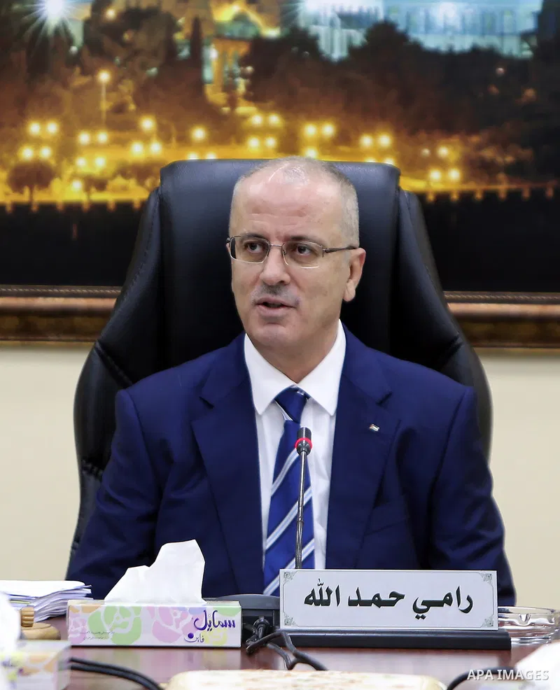 Palestinian Prime Minister Rami Hamdallah chairs a meeting of council of Ministers in the West Bank city of Ramallah, on June 06, 2017. Photo by Prime Minister Office