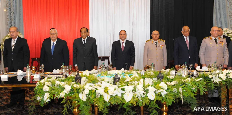 Egyptian President Abdel-Fattah al-Sisi takes part in the a breakfast to mark the anniversary the victory of the Tenth of Ramadan, during the Muslim holy month of Ramadan, in Cairo, on June 06, 2017. Photo by Egyptian Pr...
