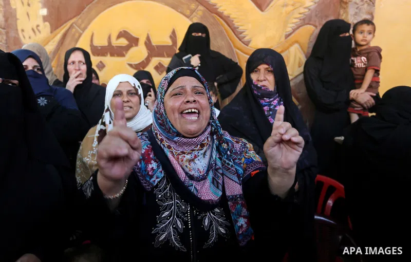 A Palestinian woman reacts during the funeral of a 25-year-old Palestinian Fadi al-Najjar who was killed by Israeli fire in the Gaza Strip during clashes with Israeli sceurity forces at the border fence the previous day,...