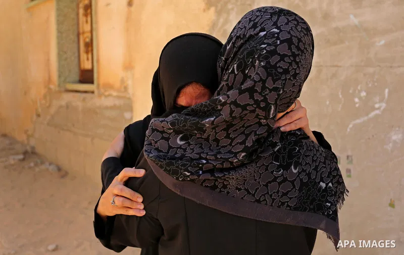 Palestinian women react during the funeral of a 25-year-old Palestinian Fadi al-Najjar who was killed by Israeli fire in the Gaza Strip during clashes with Israeli sceurity forces at the border fence the previous day, in...