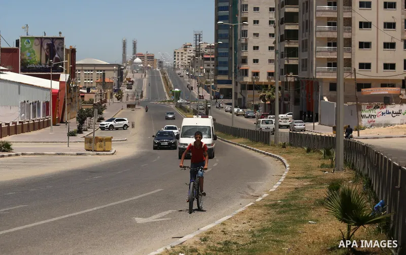 A picture taken on June 7, 2017 shows a general view of the Qatar-funded of Harun al-Rashid street which runs parallel to the beach in Gaza City. Photo by Ashraf Amra