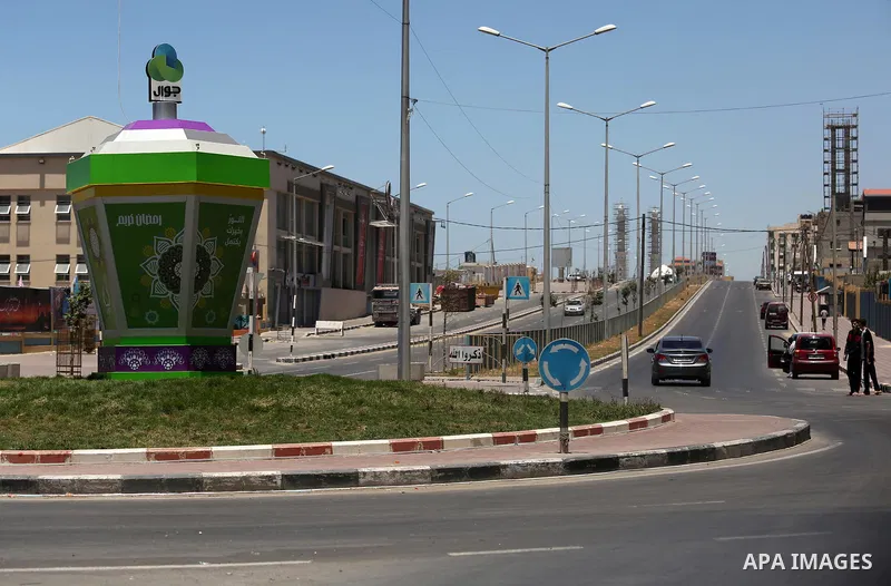A picture taken on June 7, 2017 shows a general view of the Qatar-funded of Harun al-Rashid street which runs parallel to the beach in Gaza City. Photo by Ashraf Amra