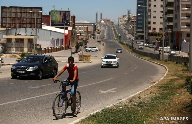 A picture taken on June 7, 2017 shows a general view of the Qatar-funded of Harun al-Rashid street which runs parallel to the beach in Gaza City. Photo by Ashraf Amra