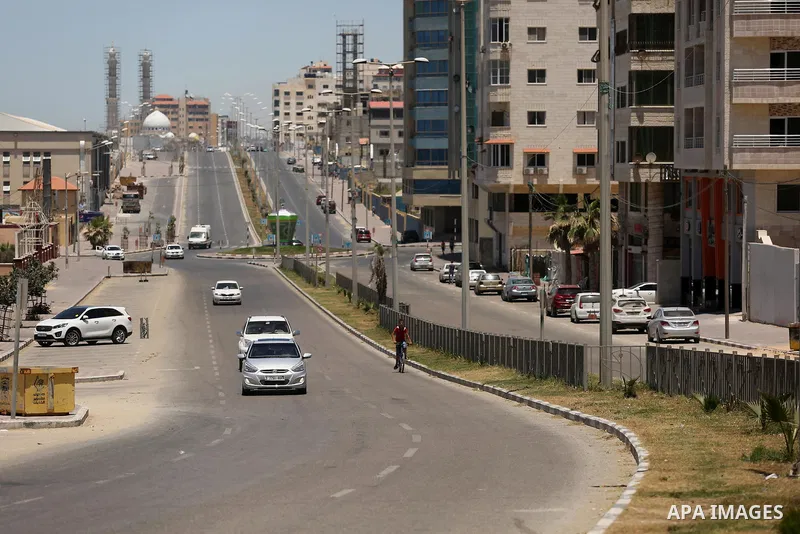 A picture taken on June 7, 2017 shows a general view of the Qatar-funded of Harun al-Rashid street which runs parallel to the beach in Gaza City. Photo by Ashraf Amra